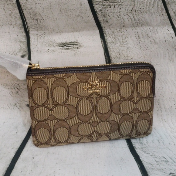 Coach Handbags - NWT brown coach wristlet